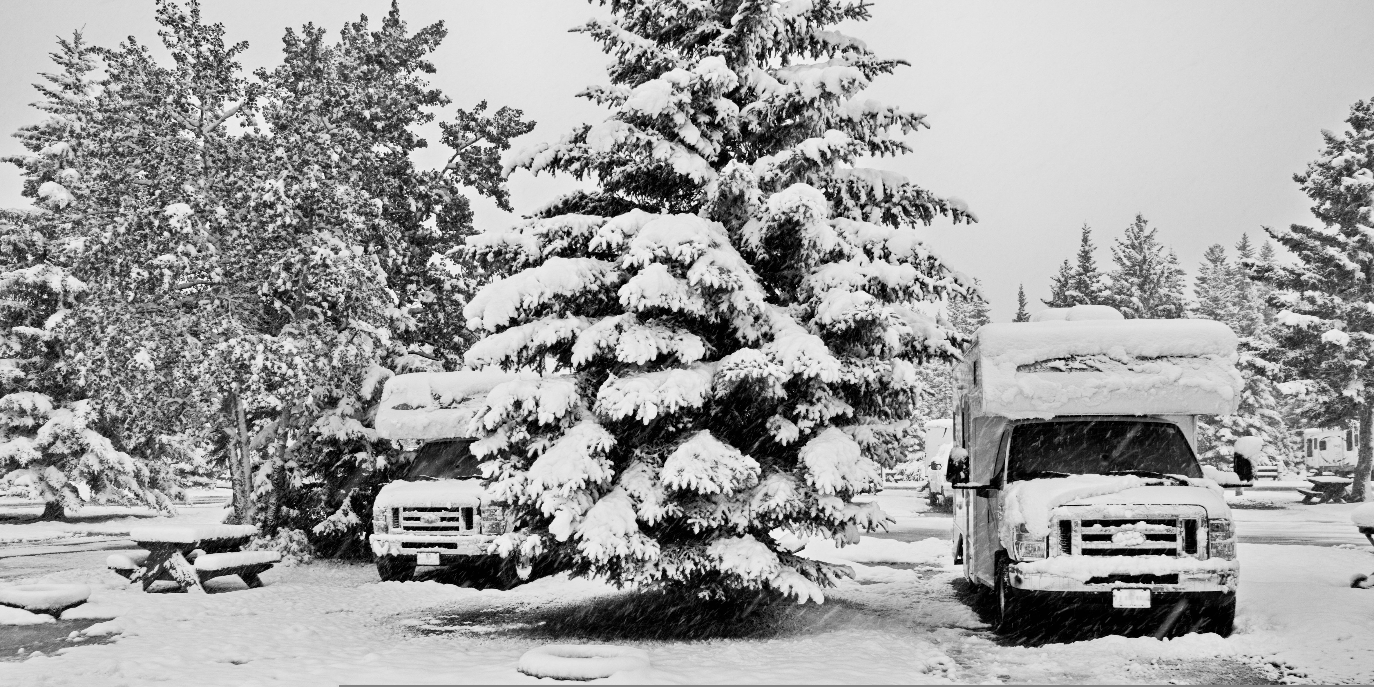Snow-covered winter scene with RVs