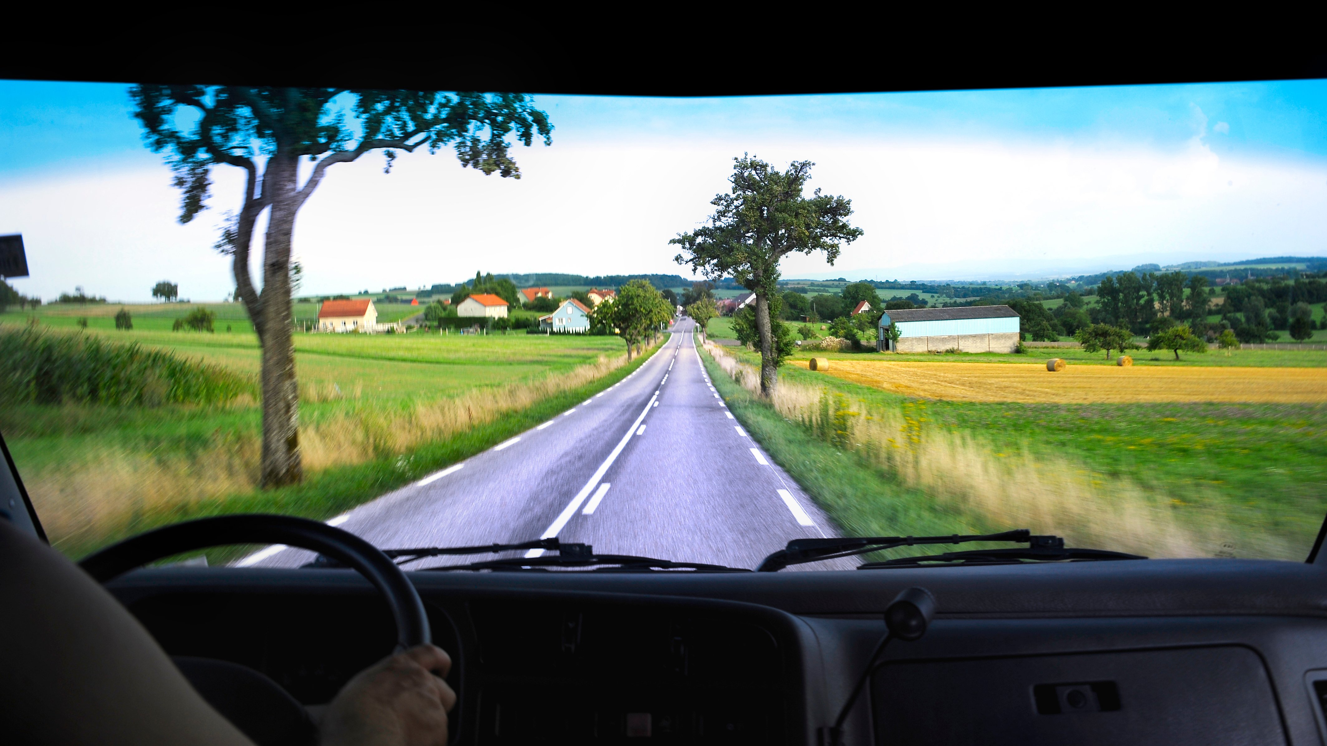 View of country road from inside an RV